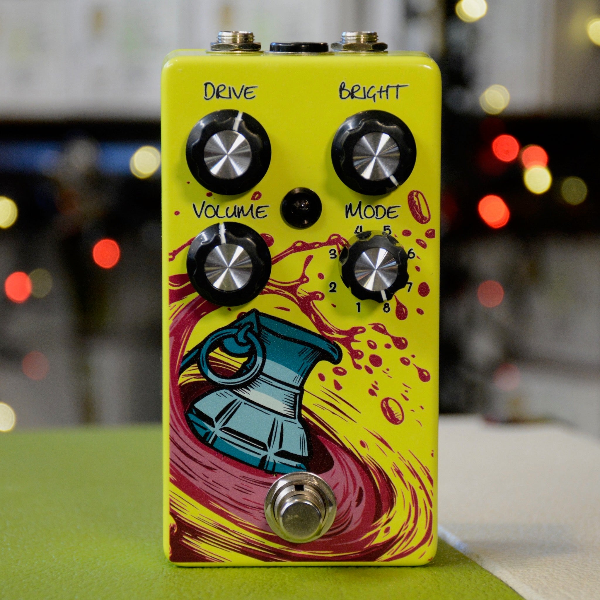 GUPTech FrAG Boost controls showing 8-mode toggle and level knob  handmade in Quebec, neon yellow, face
